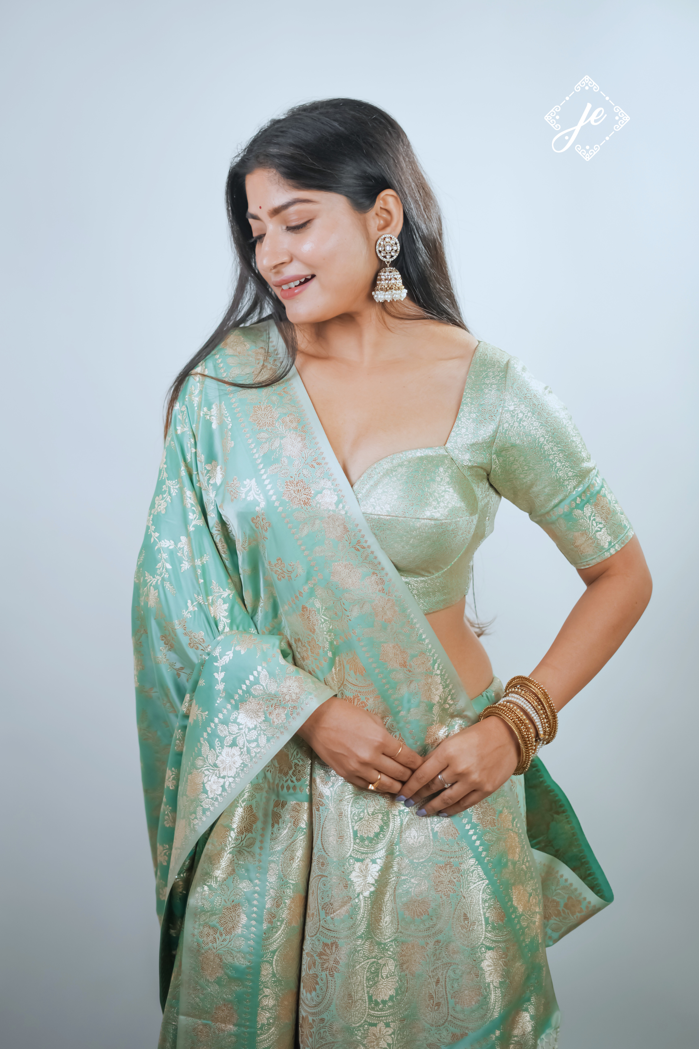 Light Blue Satin Silk Jaal Banarasi Saree