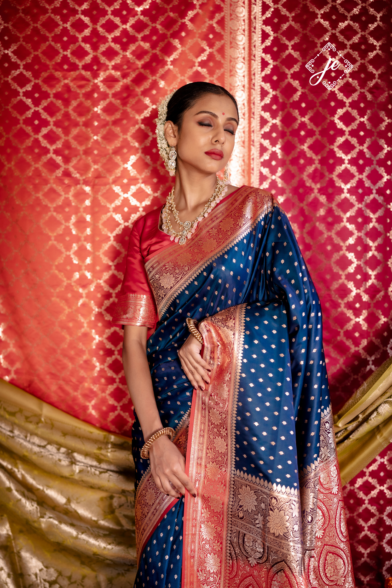 Navy Blue Satin Silk Buti Banarasi Saree with contrast Red Border