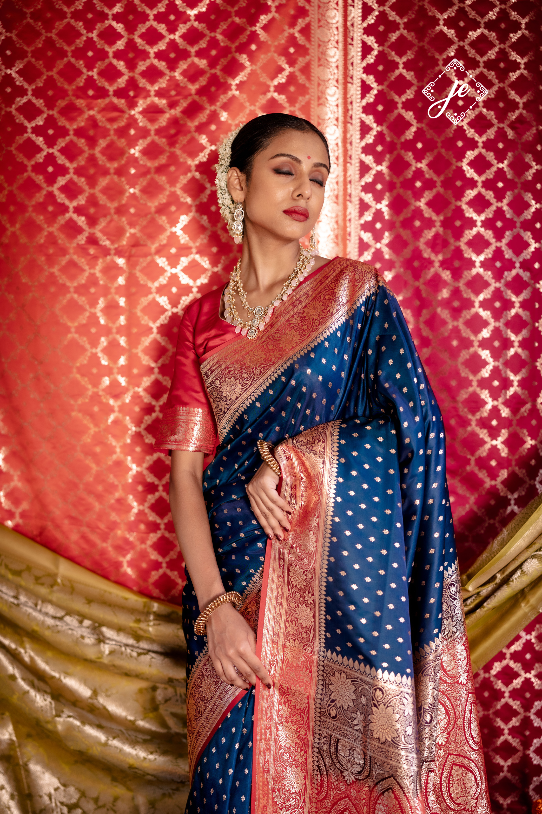 Navy Blue Satin Silk Buti Banarasi Saree with contrast Red Border