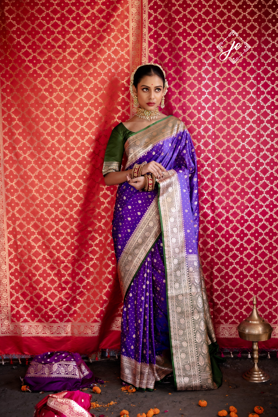 Purple Satin Silk Buti Banarasi Saree with contrast Bottle green Border