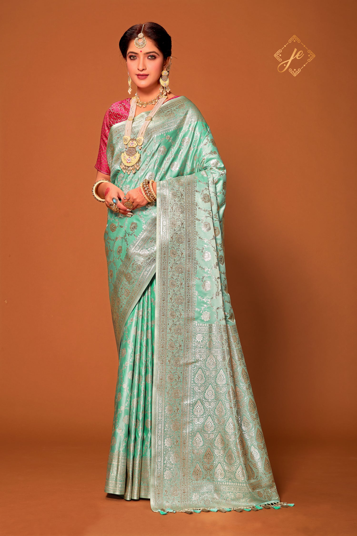 Light Sea Green Satin Silk Jaal Banarasi Saree