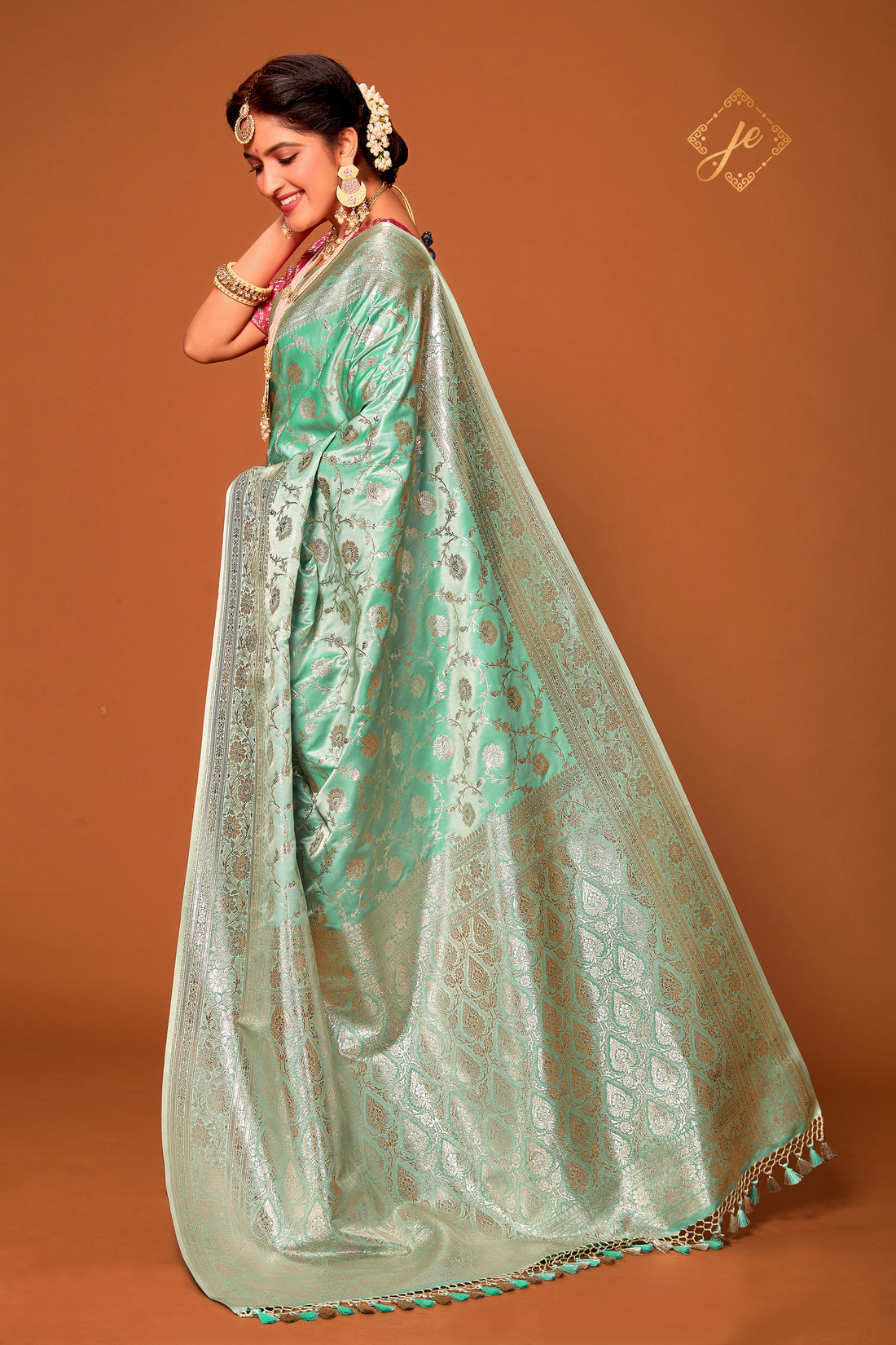 Light Sea Green Satin Silk Jaal Banarasi Saree