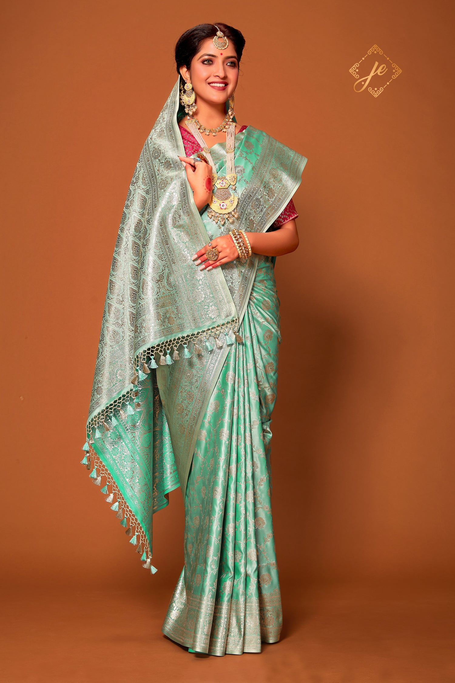 Light Sea Green Satin Silk Jaal Banarasi Saree